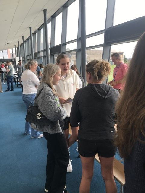 Students gathered in the cloister collecting GCSE results