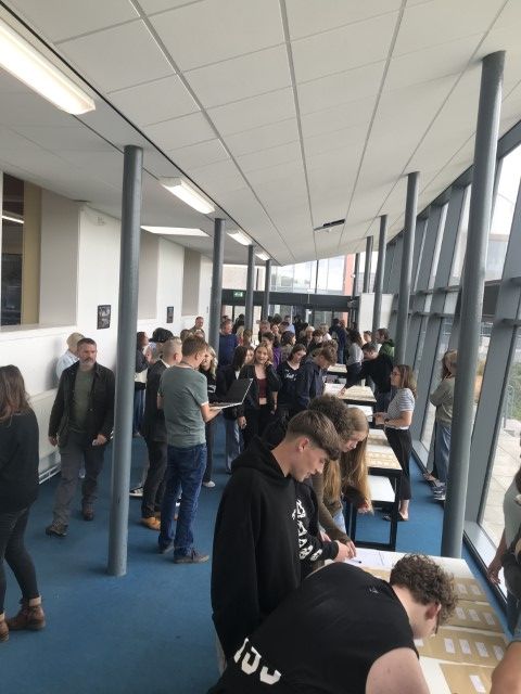 Students gathered in the cloister collecting GCSE results