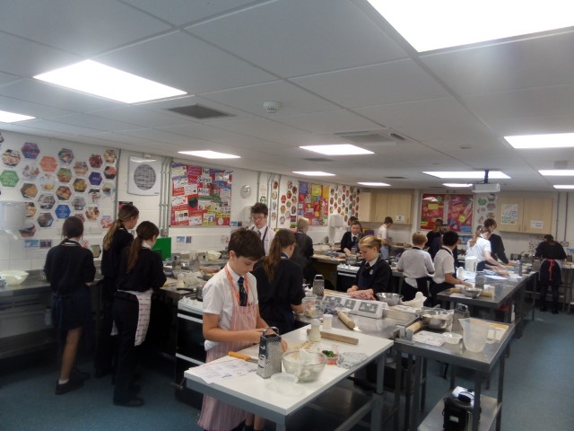 Students preparing pasta